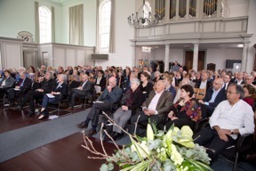people listen attentively in church